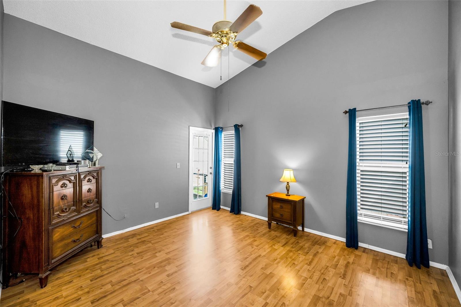 PRIMARY BEDROOM WITH ACCESS TO POOL AREA