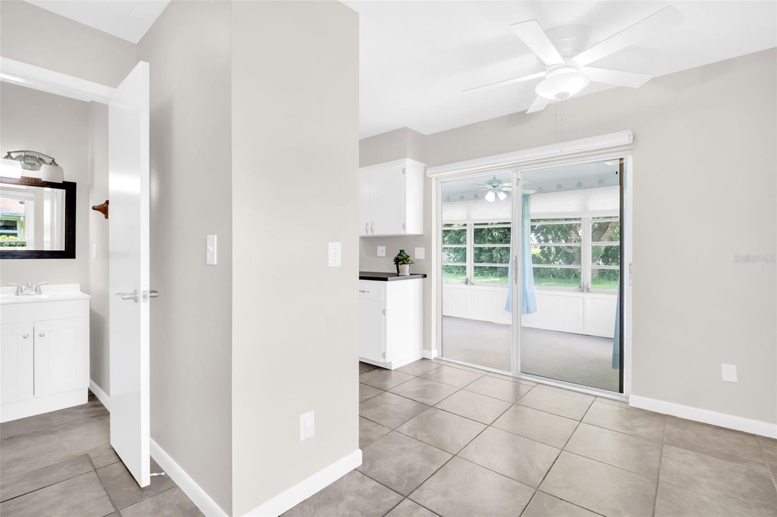 1/2 bath perfectly tucked between the kitchen & laundry~