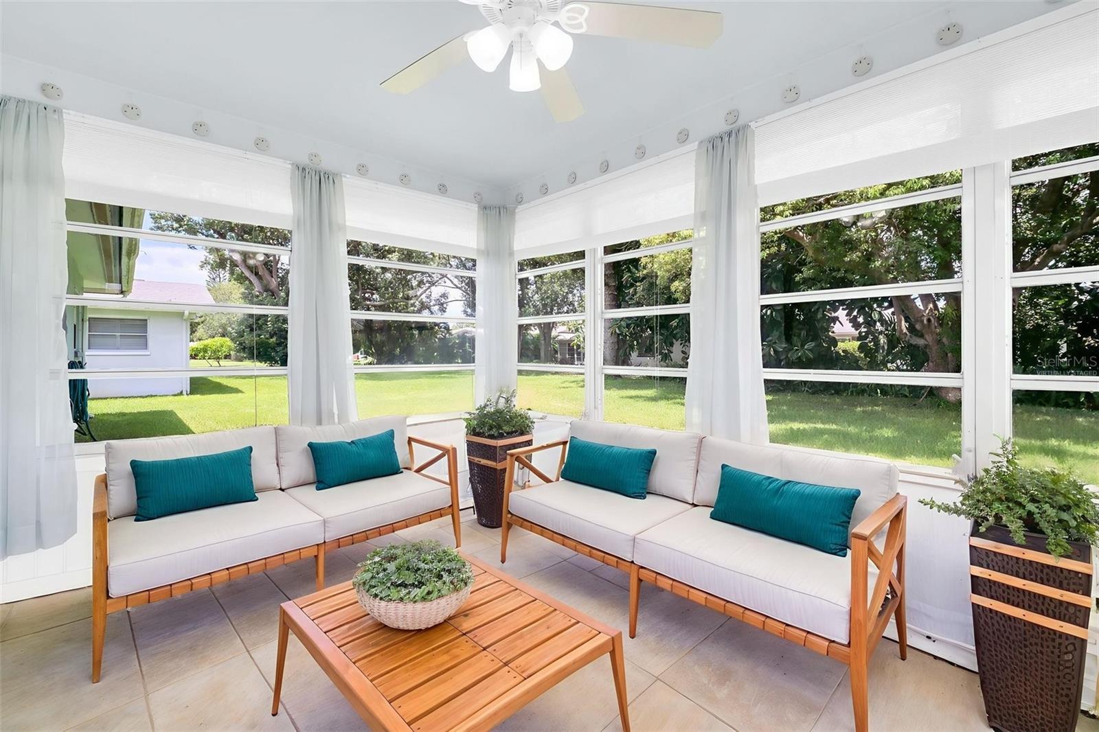 Virtually staged - Fully enclosed lanai with private green views~