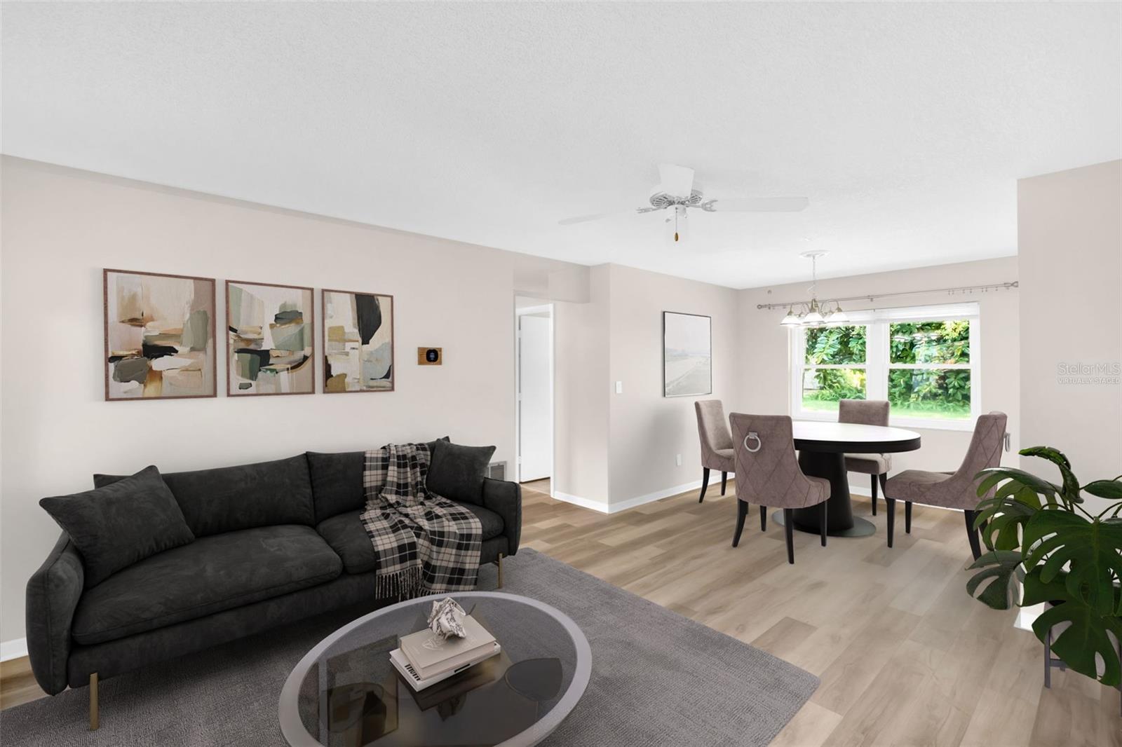 Virtually staged - Welcoming living/dining room combo~