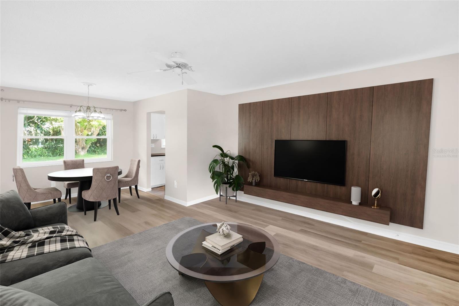Virtually staged - Natural light flows through the updated windows throughout~