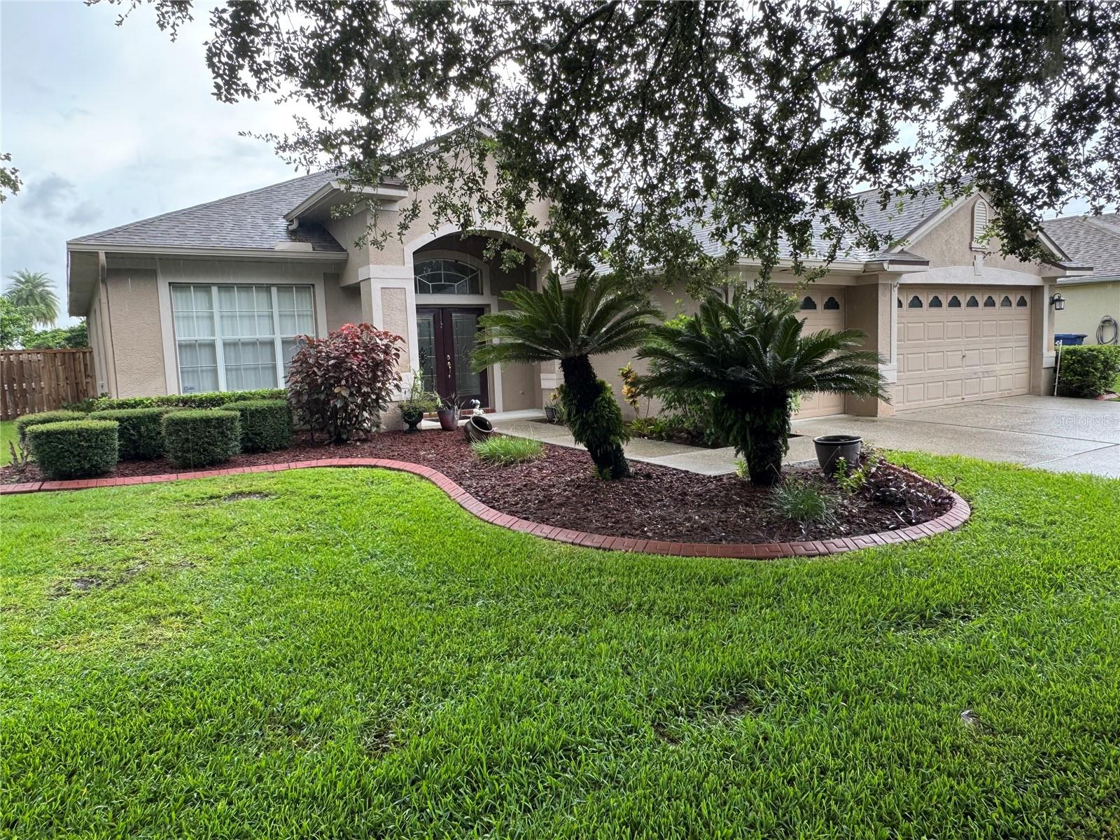 Beautiful frontage with mature landscaping