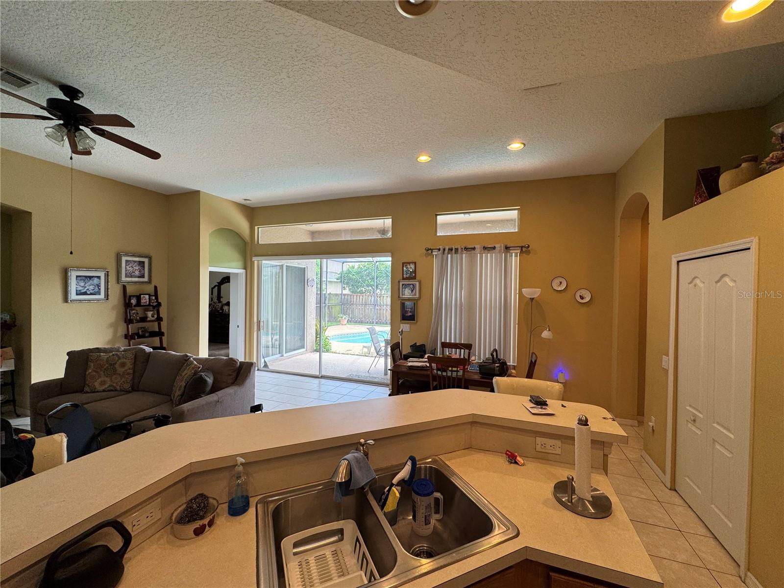 Great view into Great room with view to Pool