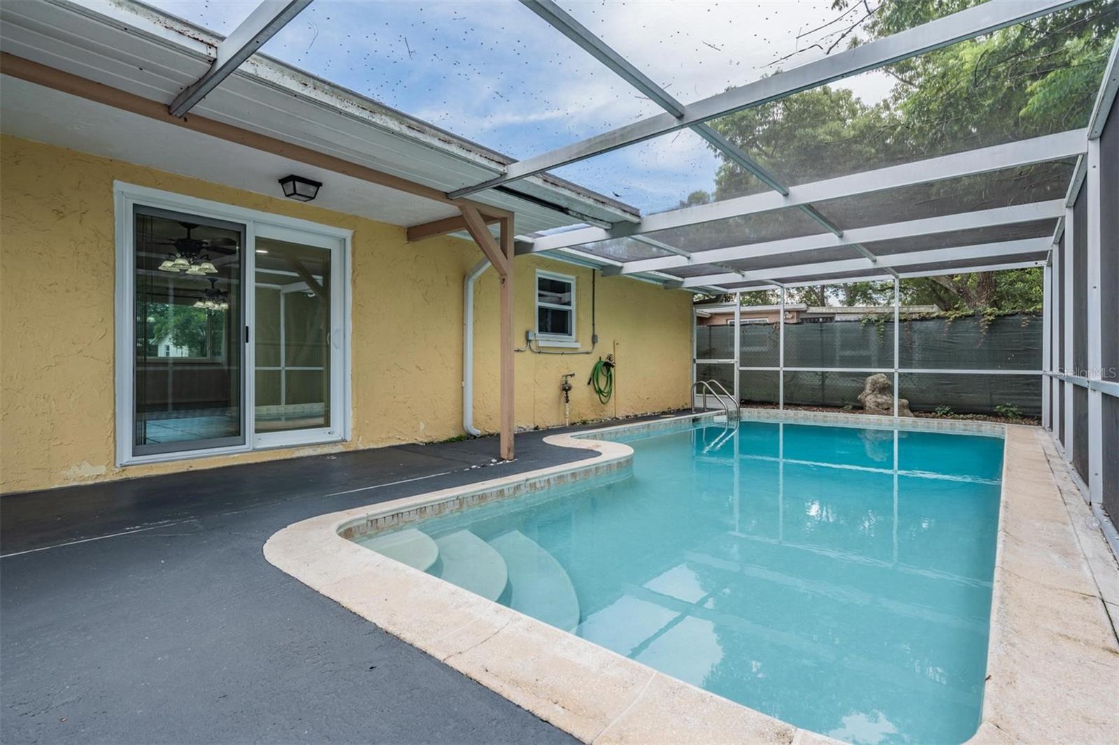 Slider from dining room out to the pool