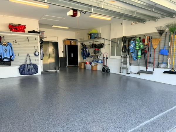 Brand New epoxy floors in extended 2 car garage