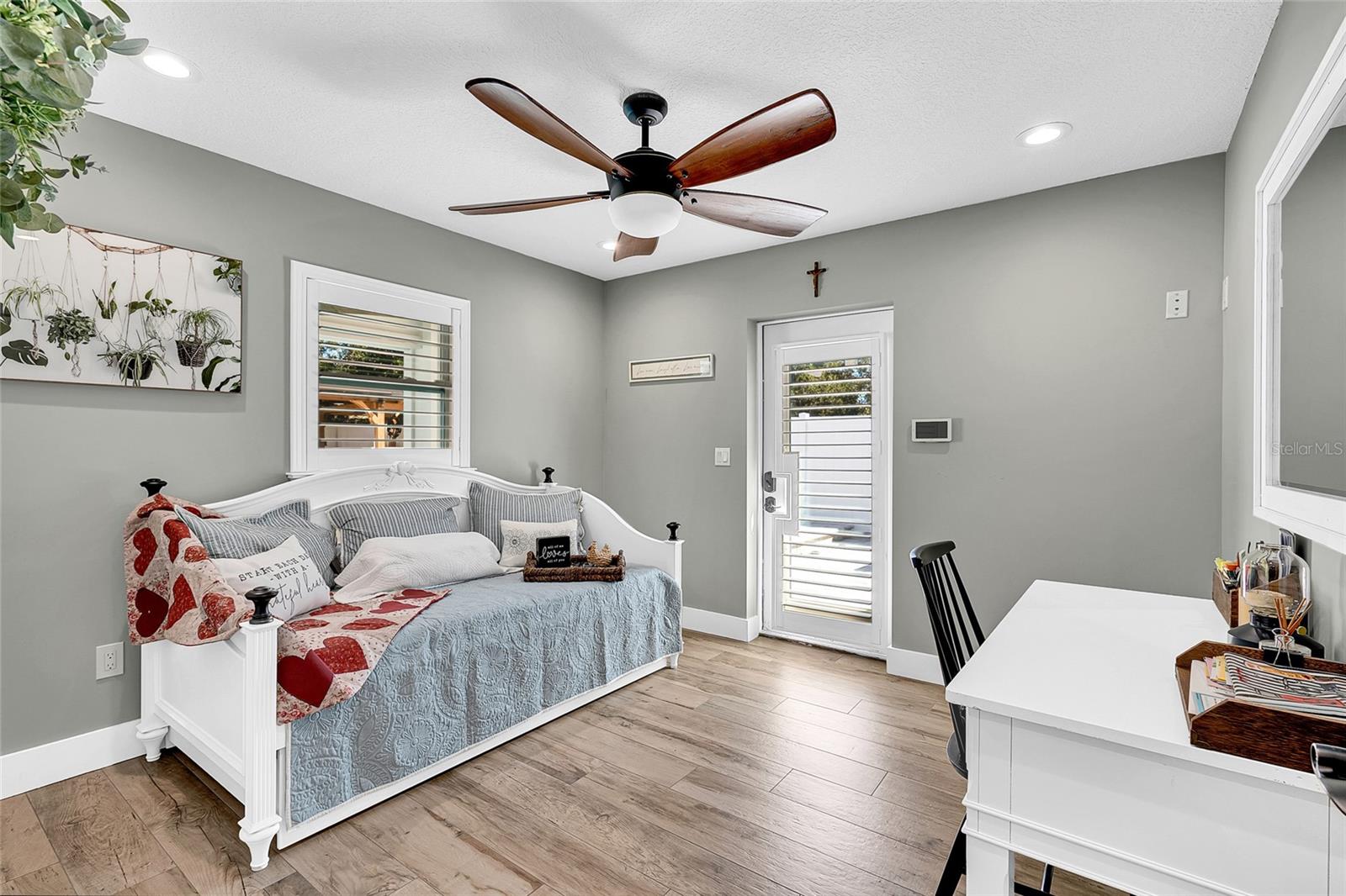 Bedroom #3 with access to the pool patio