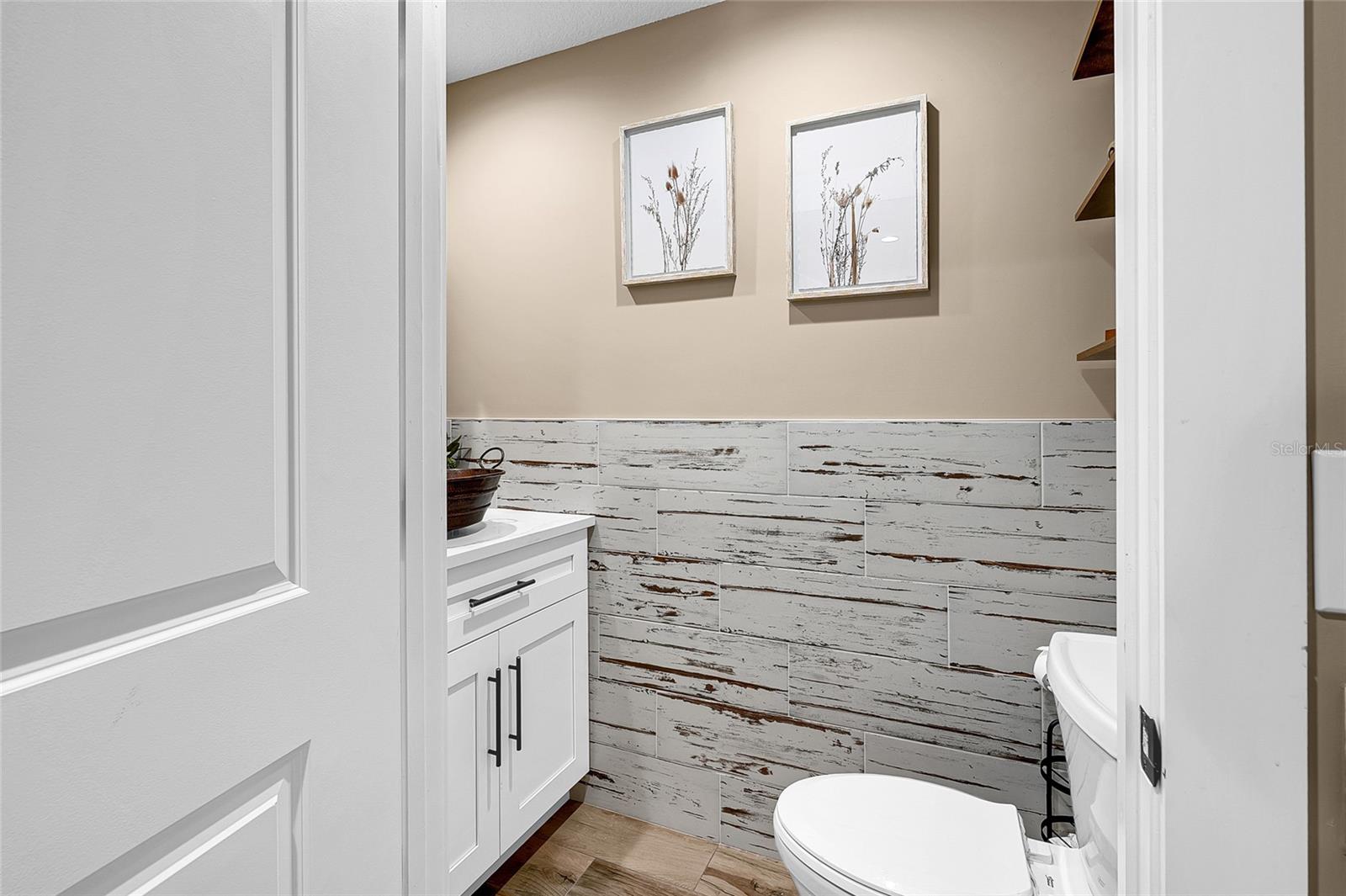half bath off laundry room and flex room