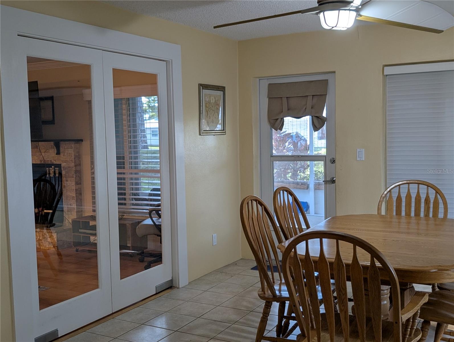 View thru Sunroom to Lanai and Florida room.