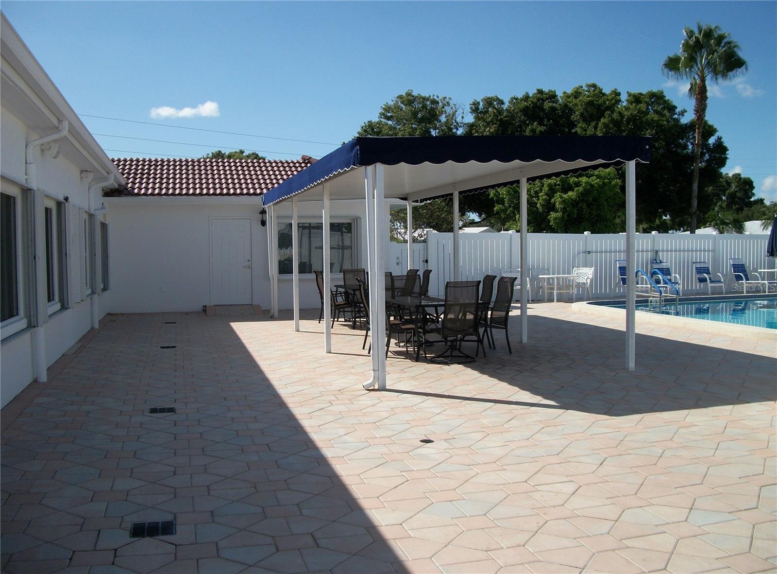 A covered sitting area for socializing out of the direct sun.