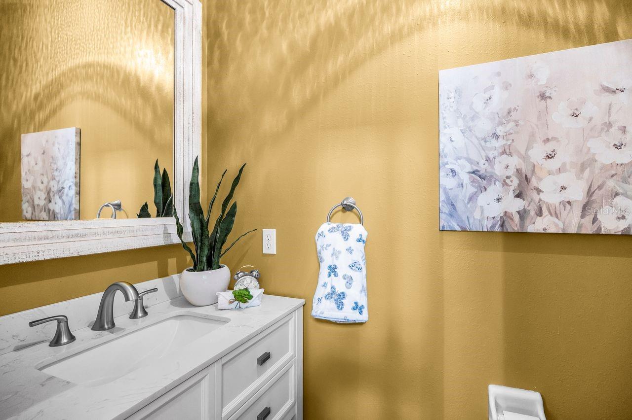 Powder room off of the living room
