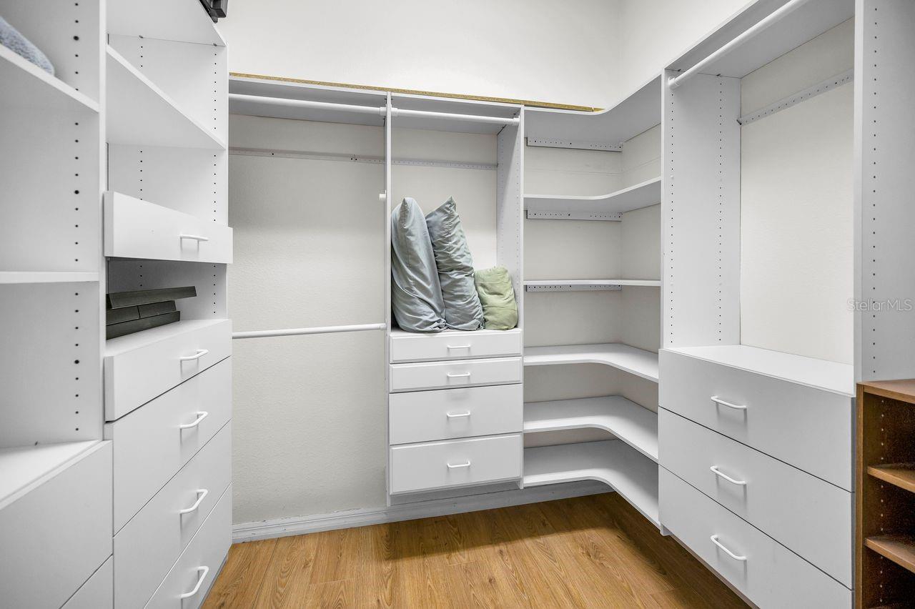 Incredible custom built closet area.