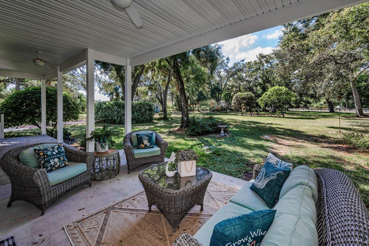 Enjoy all the sights and sounds of nature on your own covered patio.