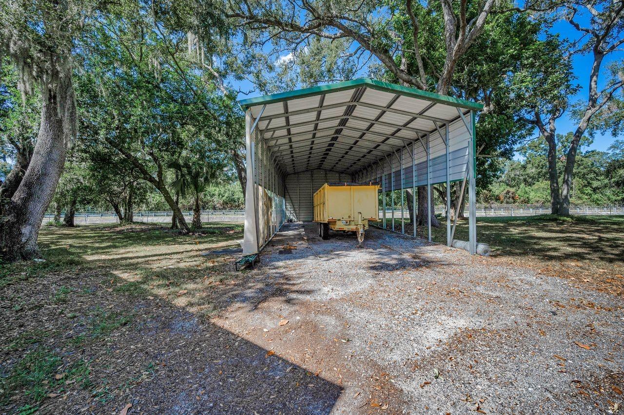 The covered parking area to the right also offers 50 amp power.