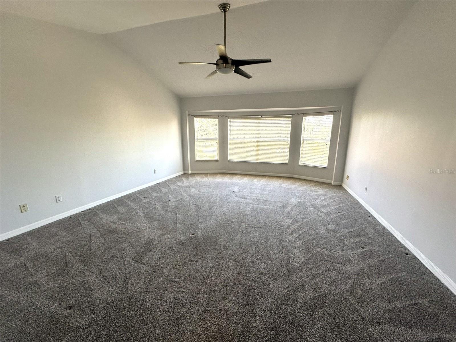 Spacious Primary BR with Vaulted Ceilings