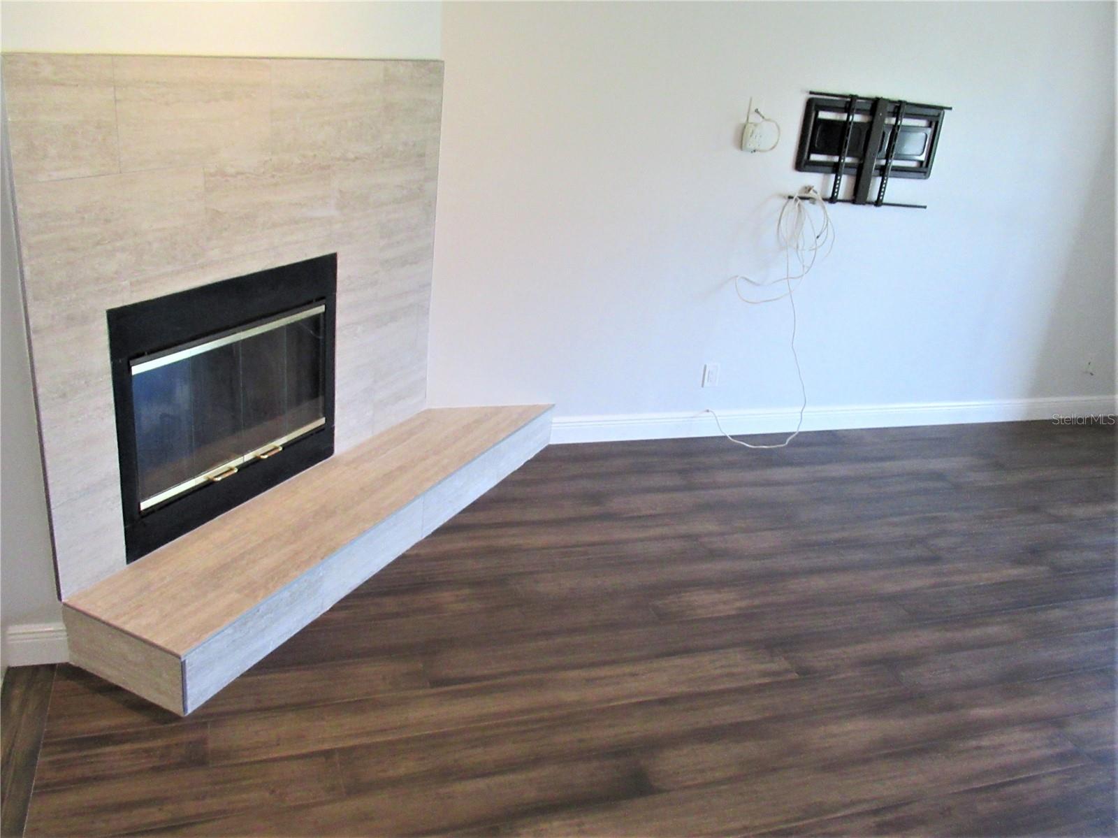Wood Burning Fireplace with coastal tile surround