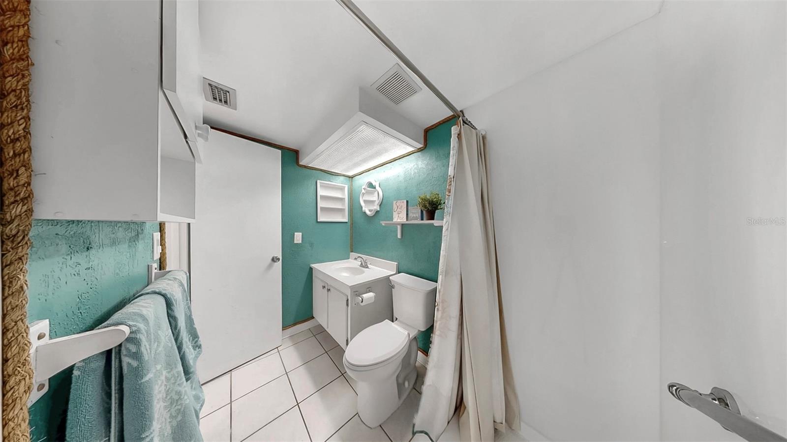 Beautiful bathroom with New step-in shower.