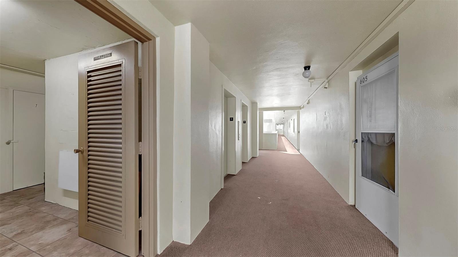 Condo is steps from the laundry room.