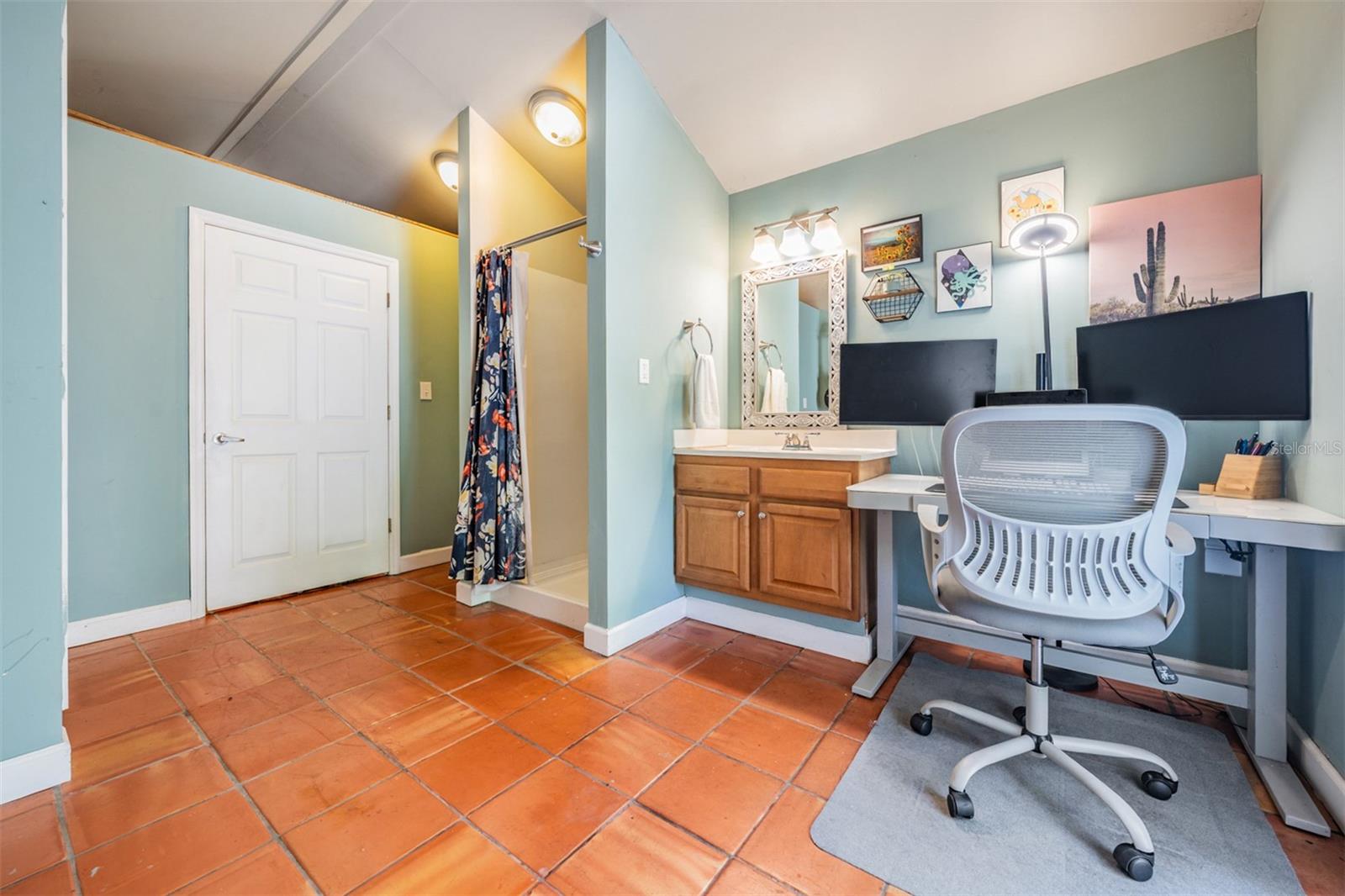 Detached studio guest cottage with full bathroom and washer/dryer hookup in closet