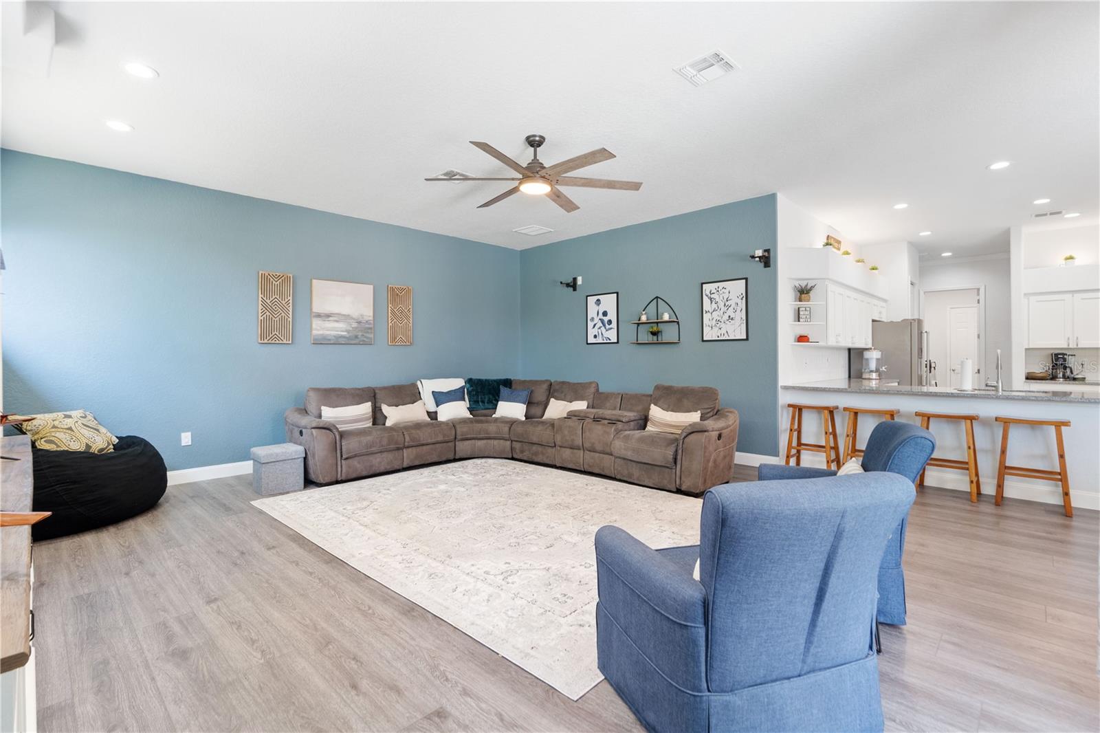 Living room is 2'1x20'. Stay connected with family and friends with the open floor plan.
