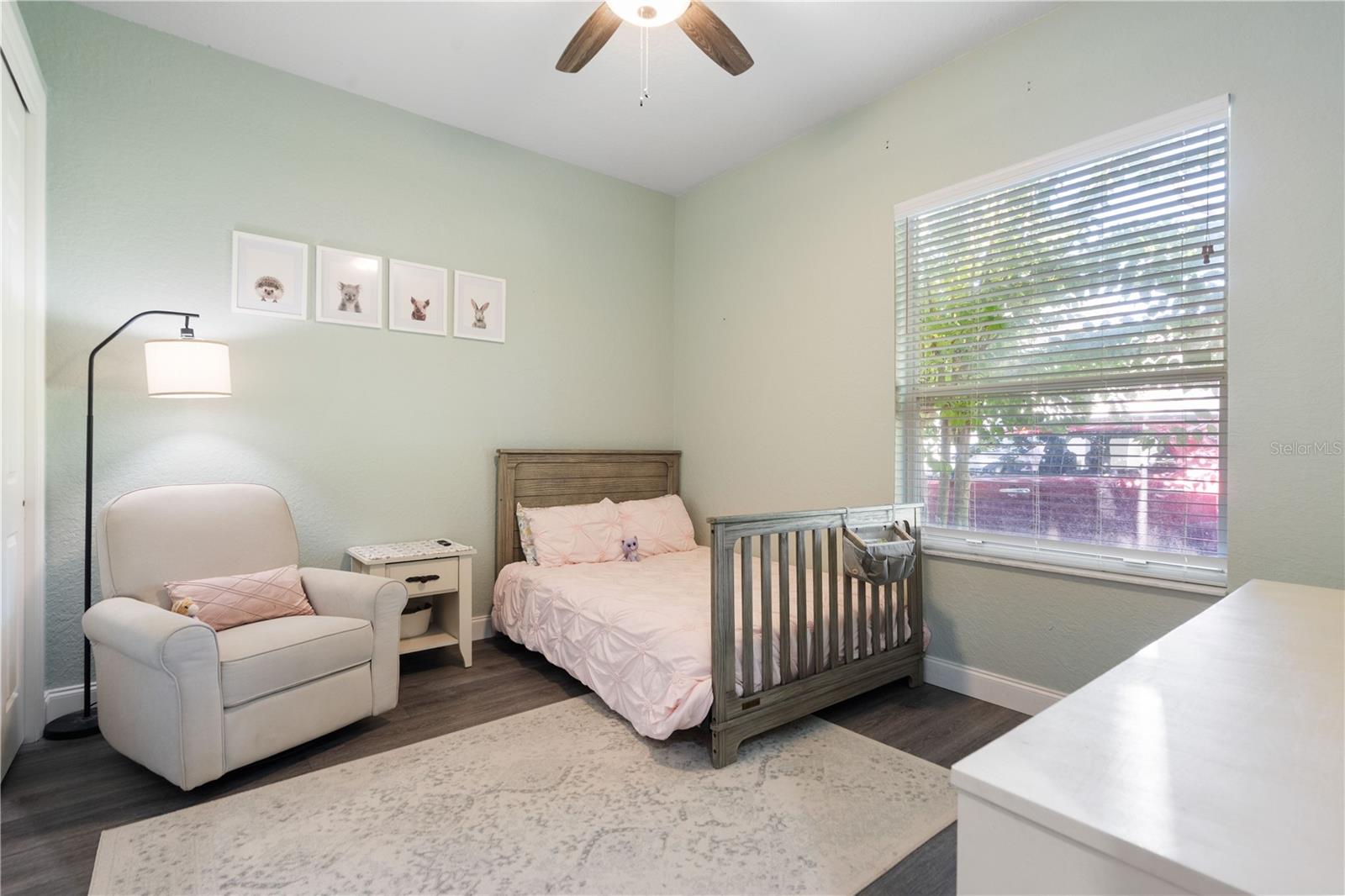 On the South West end of the home is a bedroom with a wall to wall closet