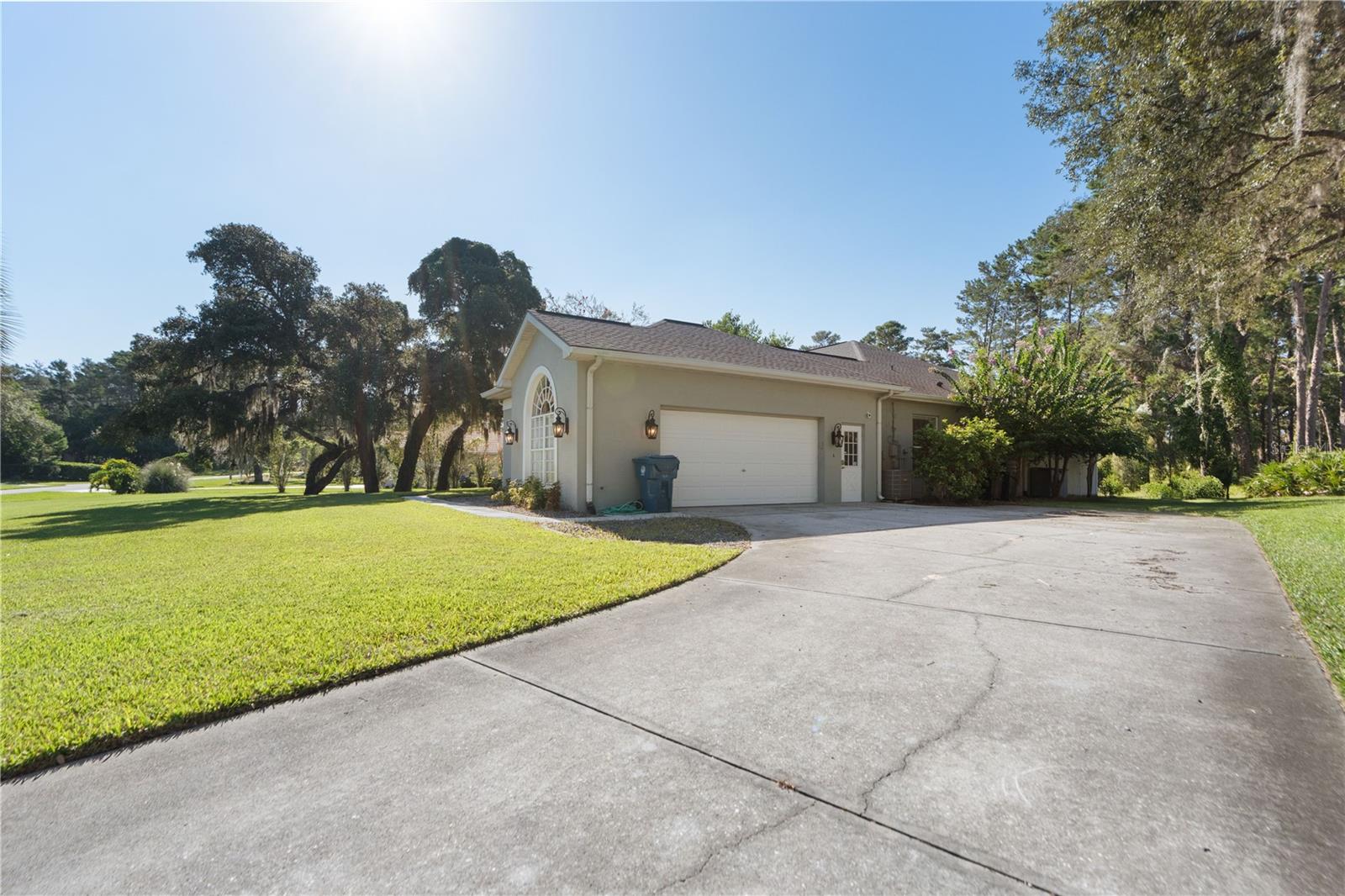 Garage faces the West side of the home. Ample drive way and parking pad for guests.