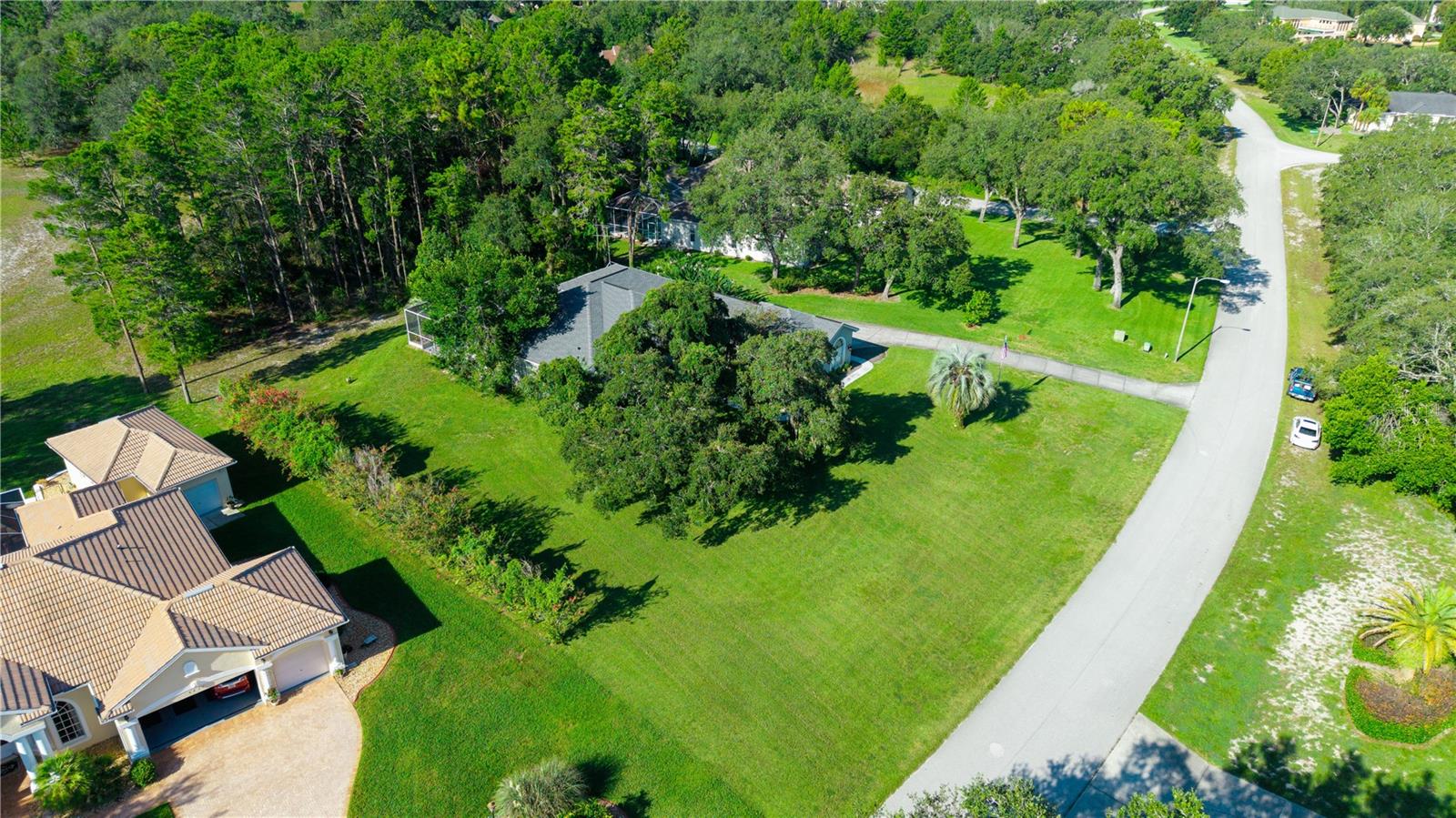 This one acre lot has a simplistic landscape which means less time managing the yard and more time to chill at the pool.