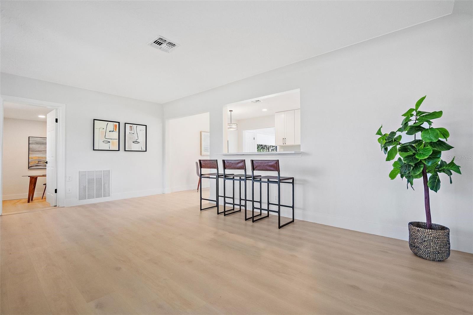 Living Room to Bonus Room/Bath/Laundry