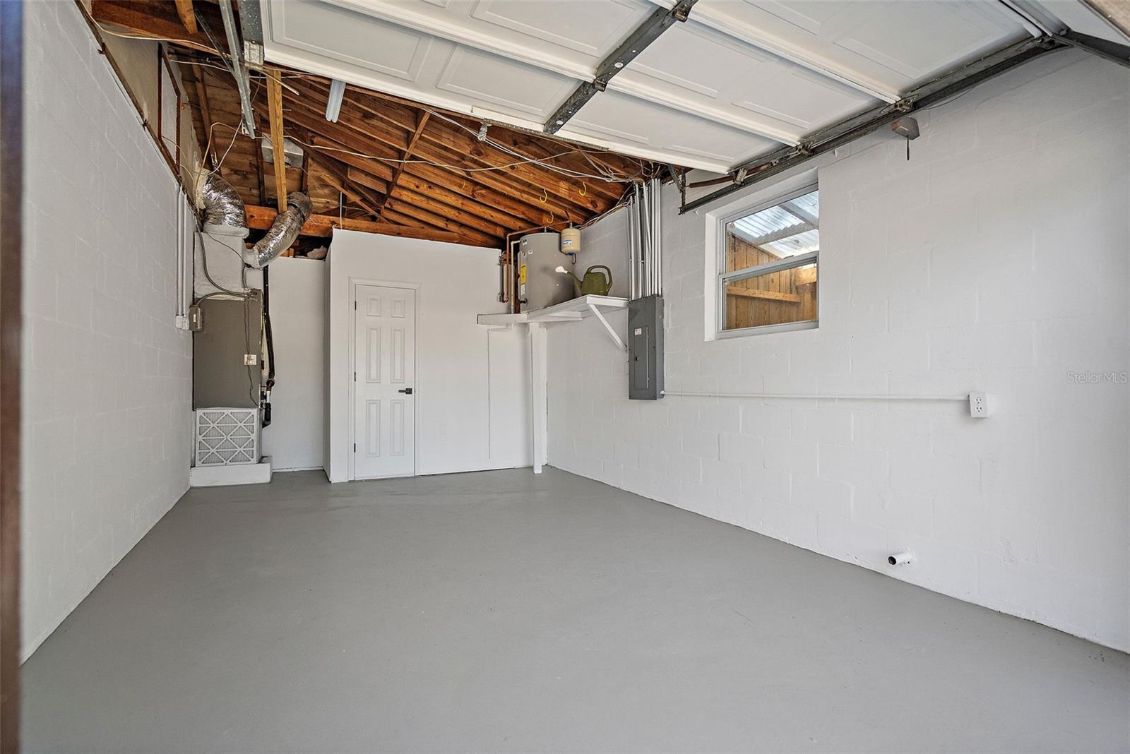 Outdoor Shed attached to Garage (visible through window)