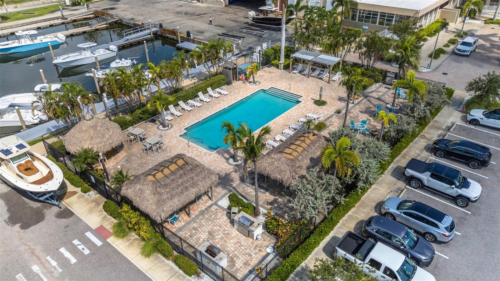 Fantastic community pool with tiki huts