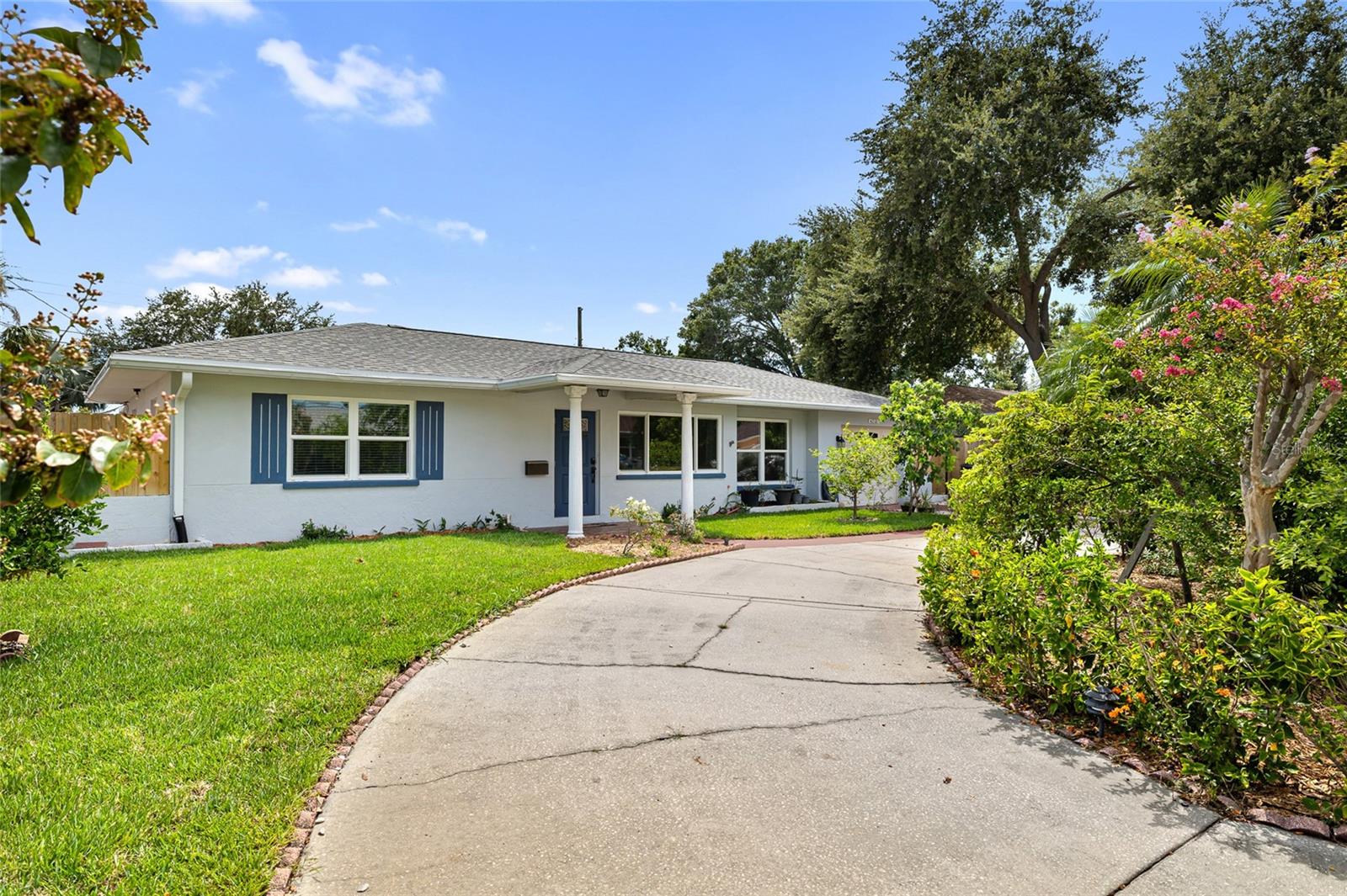 Front of house with circular driveway