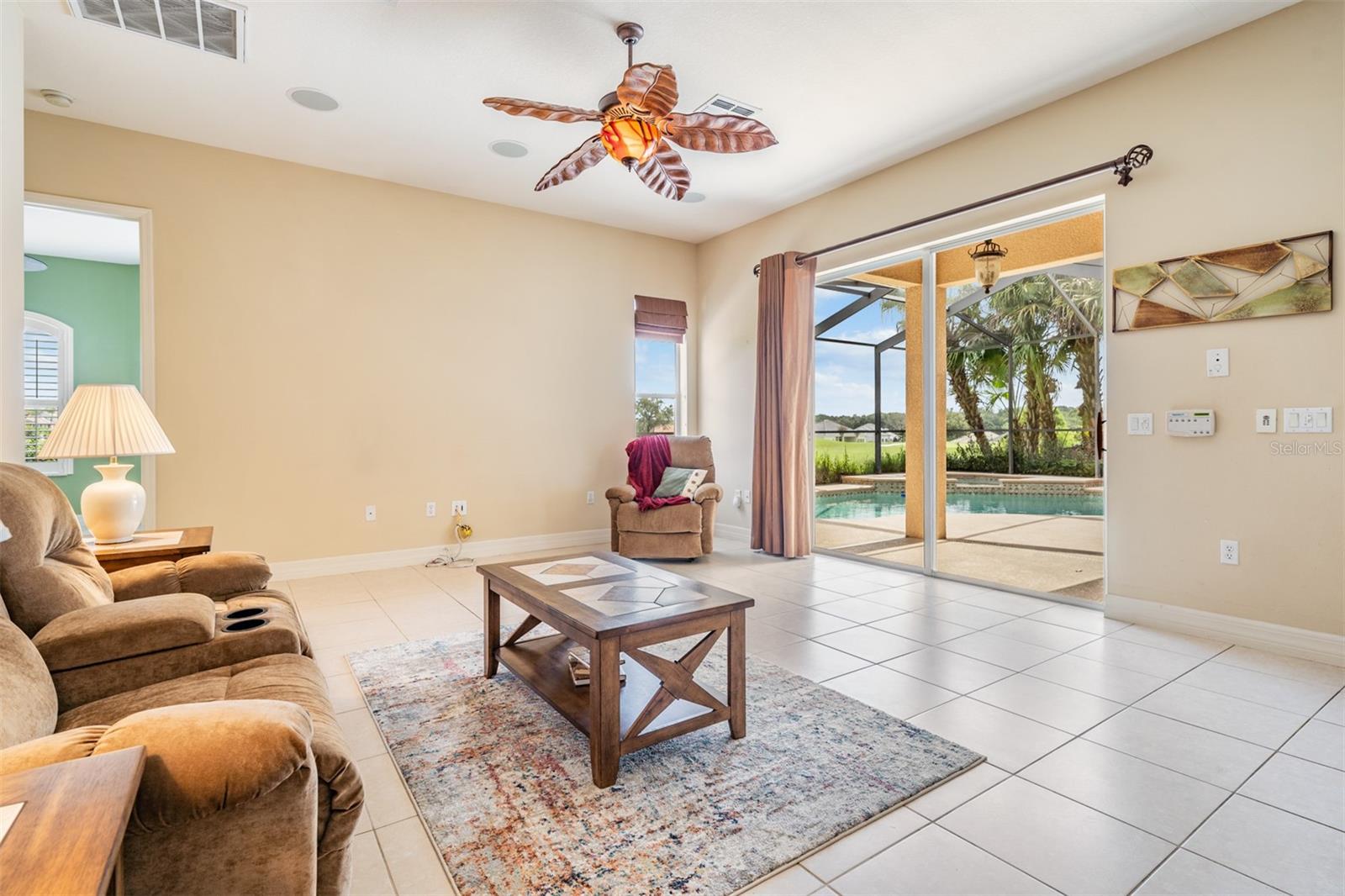 Spacious gathering room open to kitchen