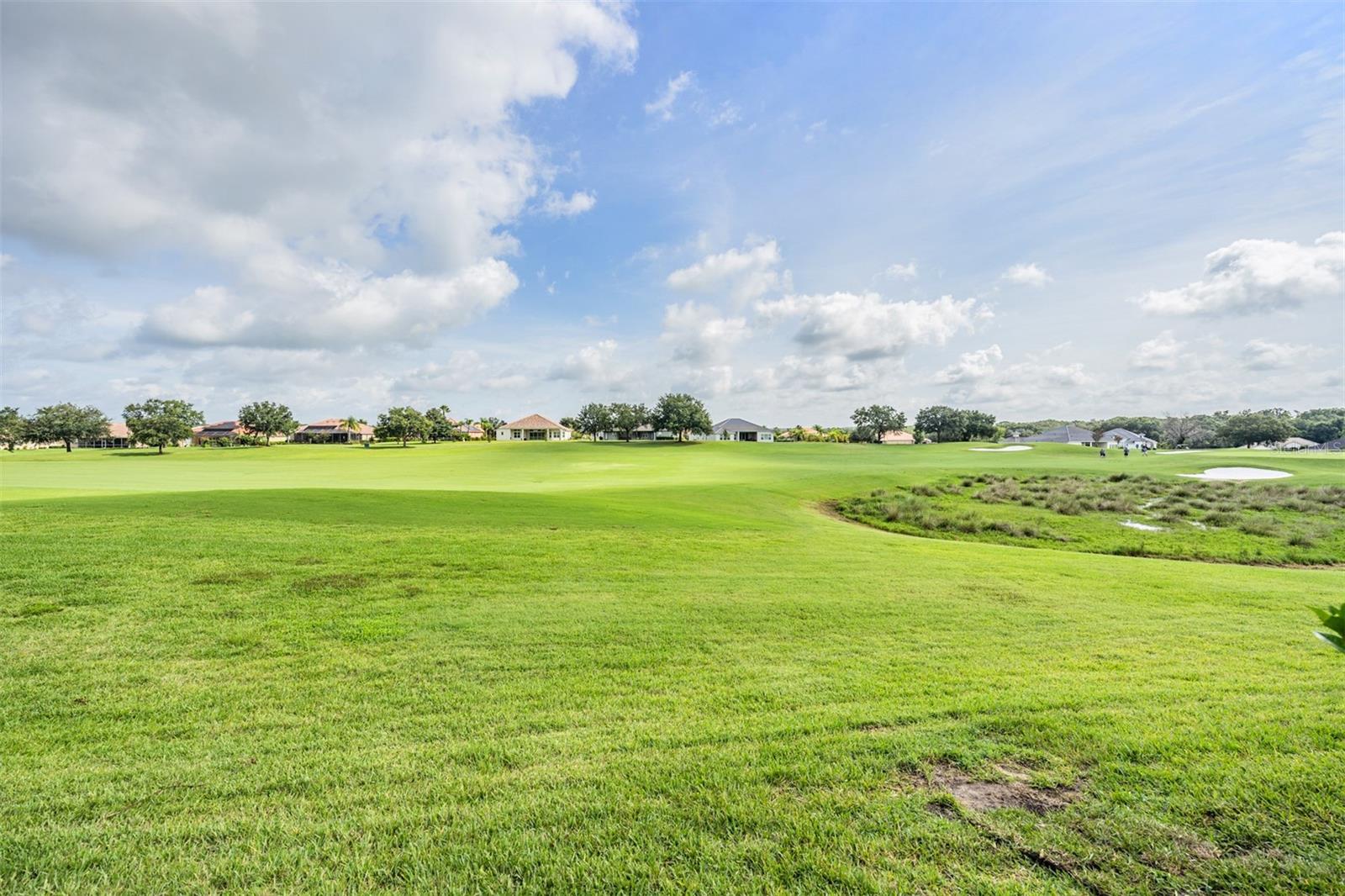 Greenscape views of the golf course and rolling hills beyond!