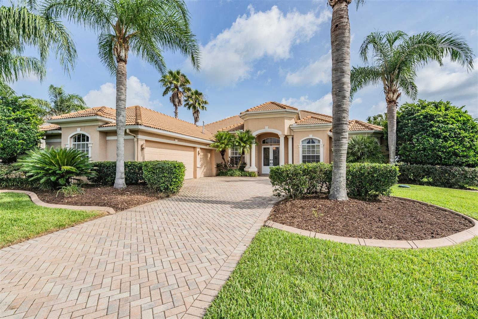 Paver driveway with plenty of parking