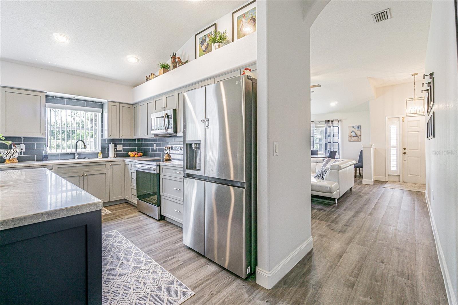 LVP floors usher you thru home!