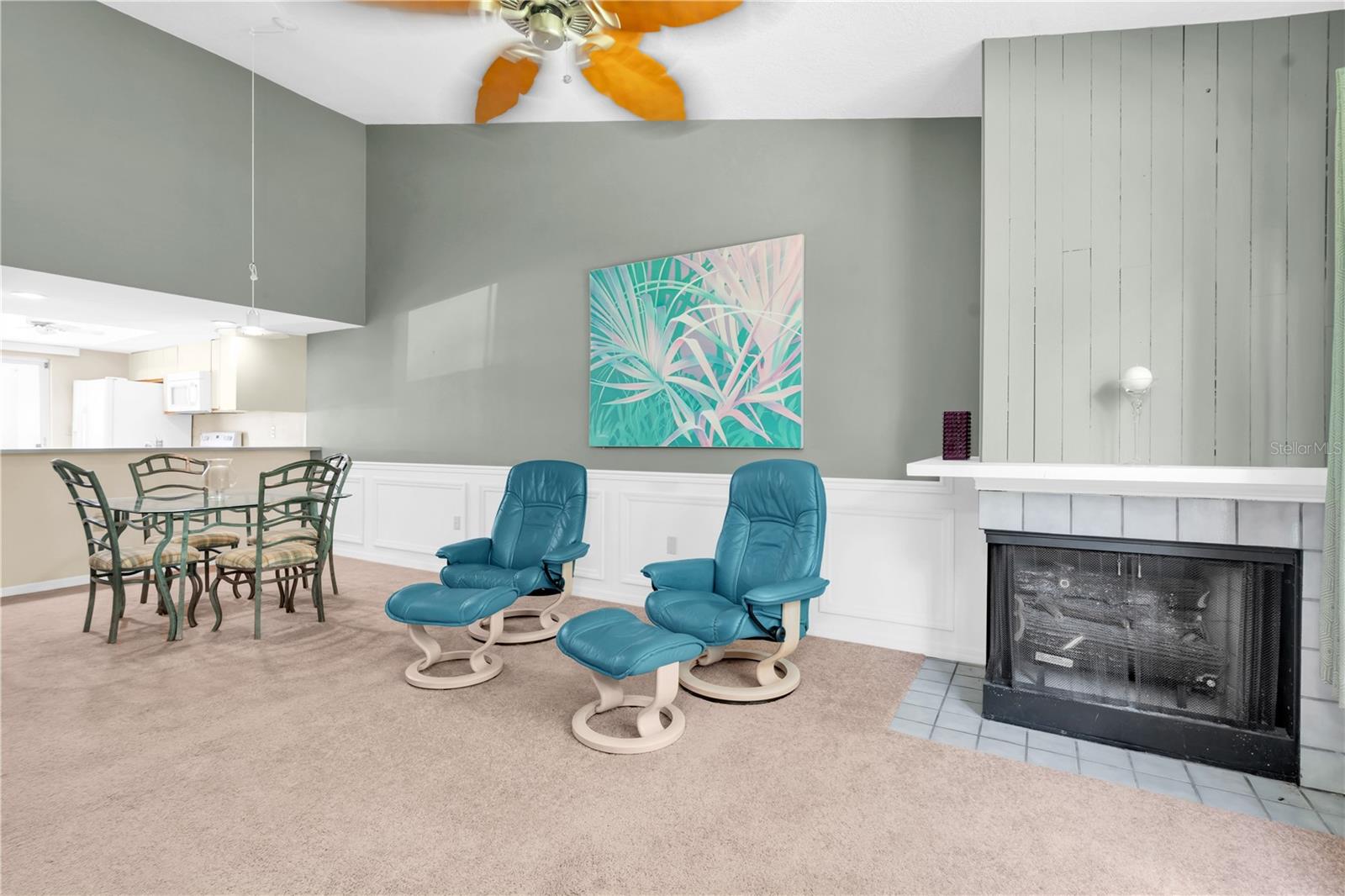 WIDER ANGLE OF DINING AND LIVING AREAS; GAS FIREPLACE ON THE RIGHT; VAULTED VOLUME CEILINGS WITH CEILING FAN AND LIGHT  (1377 MCMULLEN BOOTH RD)