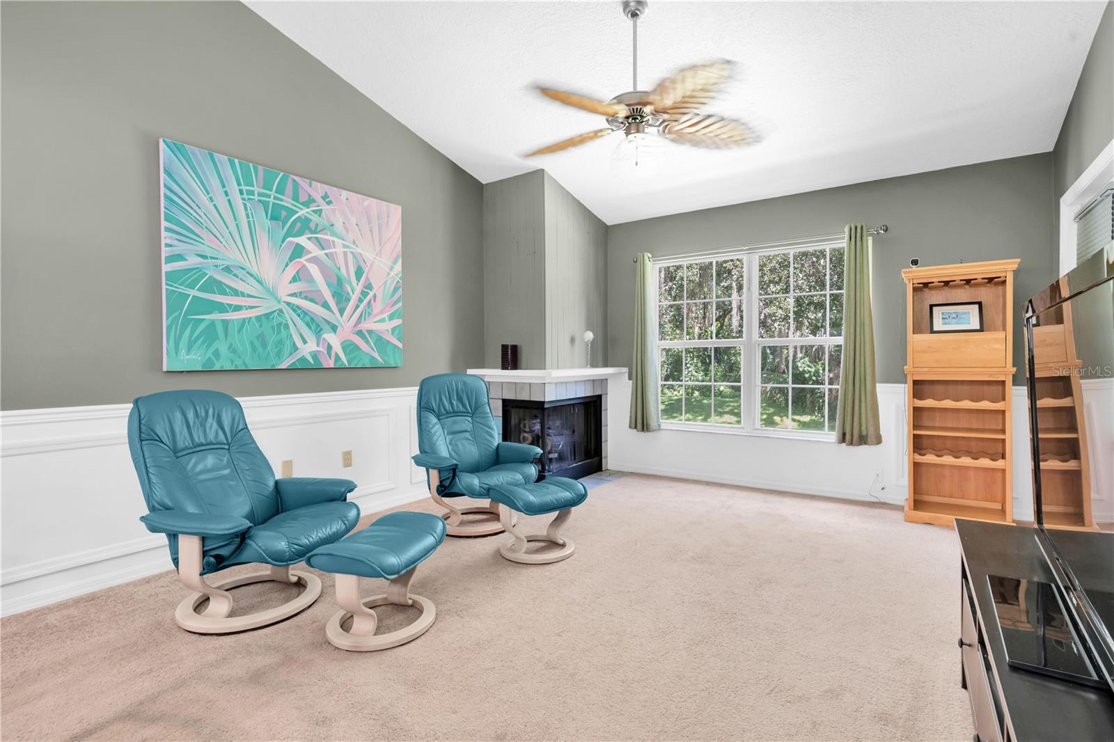 LIVING AREA, GAS FIREPLACE IN BACKGROUND; GREAT NATURAL LIGHT COMES IN THROUGH THOSE DOUBLE-PANE WINDOWS; HIGH CEILINGS WITH CEILING FAN AND LIGHT  (1377 MCMULLEN BOOTH RD); SPECTRUM IS THE CABLE PROVIDER, BASIC INTERNET IS INCLUDED IN MONTHLY $770 FEE  (1377 MCMULLEN BOOTH RD)