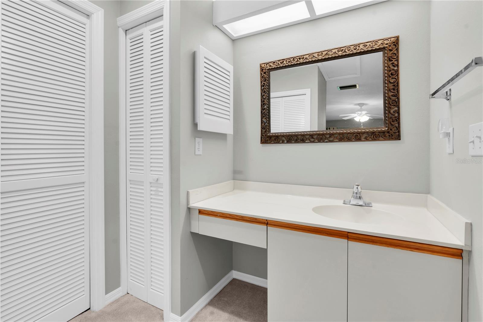 CAN YOU PICTURE YOUR SASSY MAKE-UP THRONE HERE? TO THE LEFT IS A GIANT WRAP-AROUND, DEEP CLOSET, HAS THREE ACCESS DOORS AND WRAPS AROUND THE INSIDE CORNER, EASY ACCESS; TO THE RIGHT (NOT VISIBLE) IS A SEPARATE ROOM WITH THE COMMODE AND SHOWER (WITH TUB); ACCOMPLISH YOUR THREE Ss IN TOTAL PRIVACY  (1377 MCMULLEN BOOTH RD)