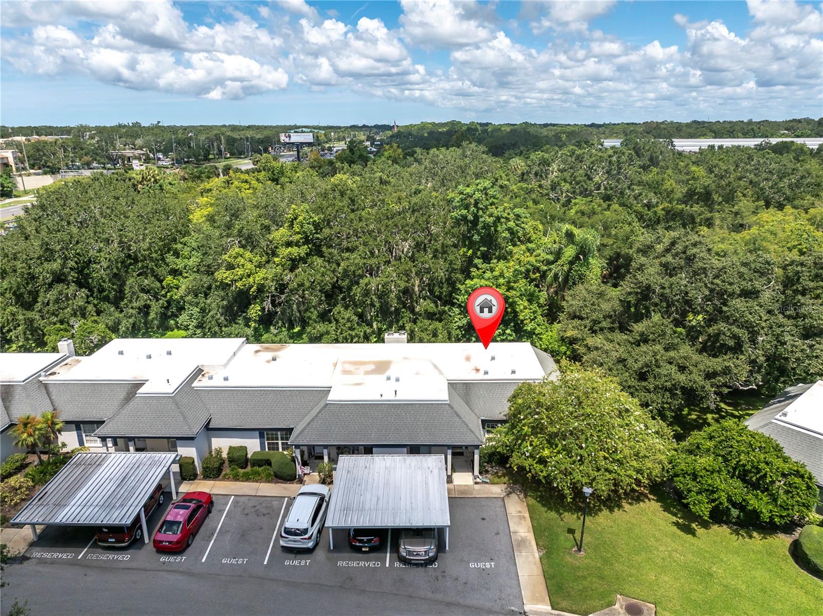 OH HEY! CHECK OUT ALL THAT GUEST PARKING...LET ME KNOW WHEN THE HOUSEWARMING PARTY IS!  THIS IS A CORNER UNIT THAT BACKS UP TO SOME LUSH WOODED GREEN SPACE  (1377 MCMULLEN BOOTH RD)