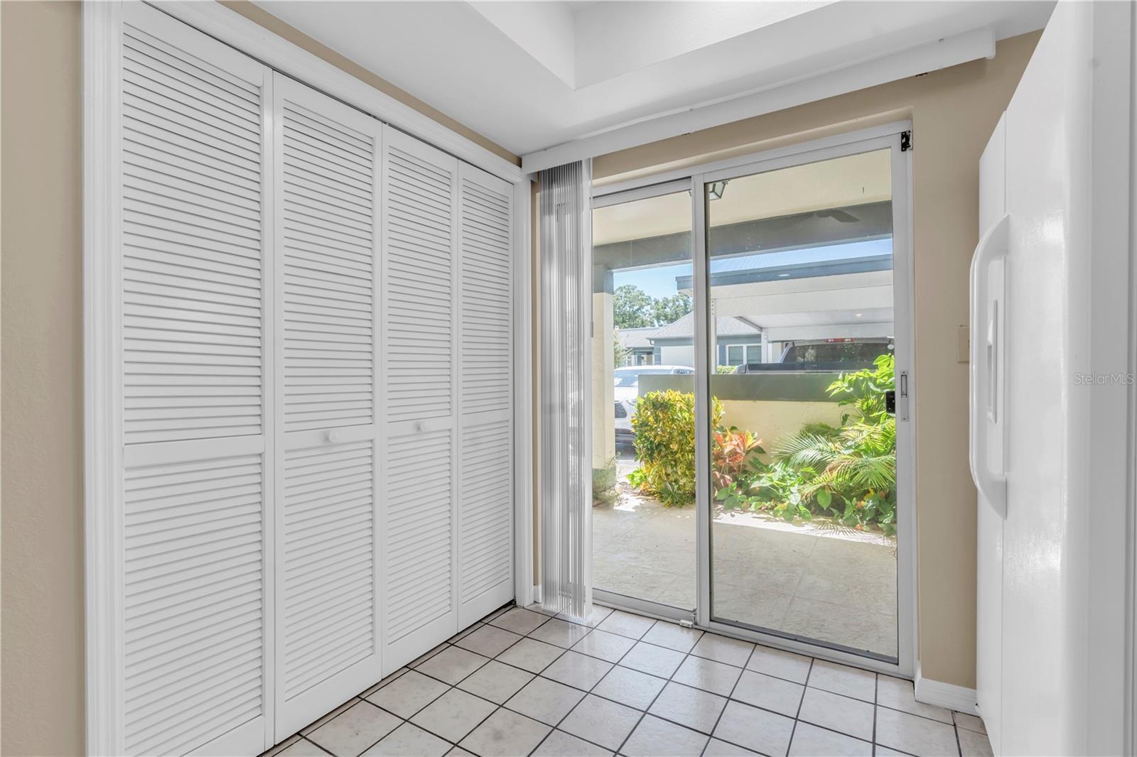 LARGE LAUNDRY/STORAGE CLOSET IN KITCHEN; SLIDER GOES OUT TO FRONT COURTYARD; FULL SIZE, SIDE BY SIDE WASHER AND DRYER INCLUDED; ROOM FOR ADDITIONAL STORAGE ITEMS  (1377 MCMULLEN BOOTH RD)