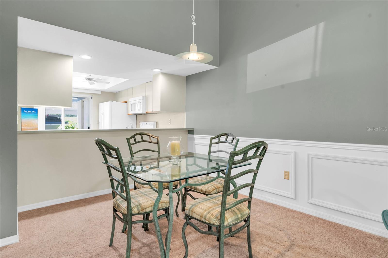 DINING AREA LOOKING BACK TOWARD KITCHEN OVER BREAKFAST BAR; CAN FIT BAR CHAIRS; VAULTED CEILING  (1377 MCMULLEN BOOTH RD)