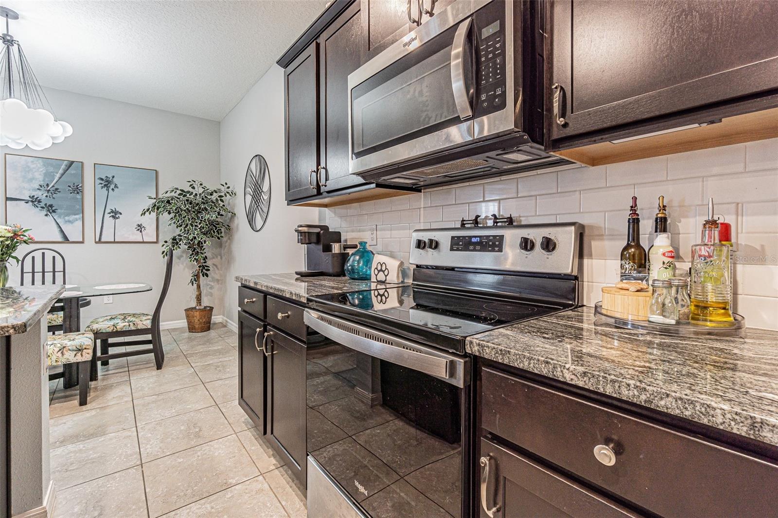 Espresso cabinets and stainless appliances