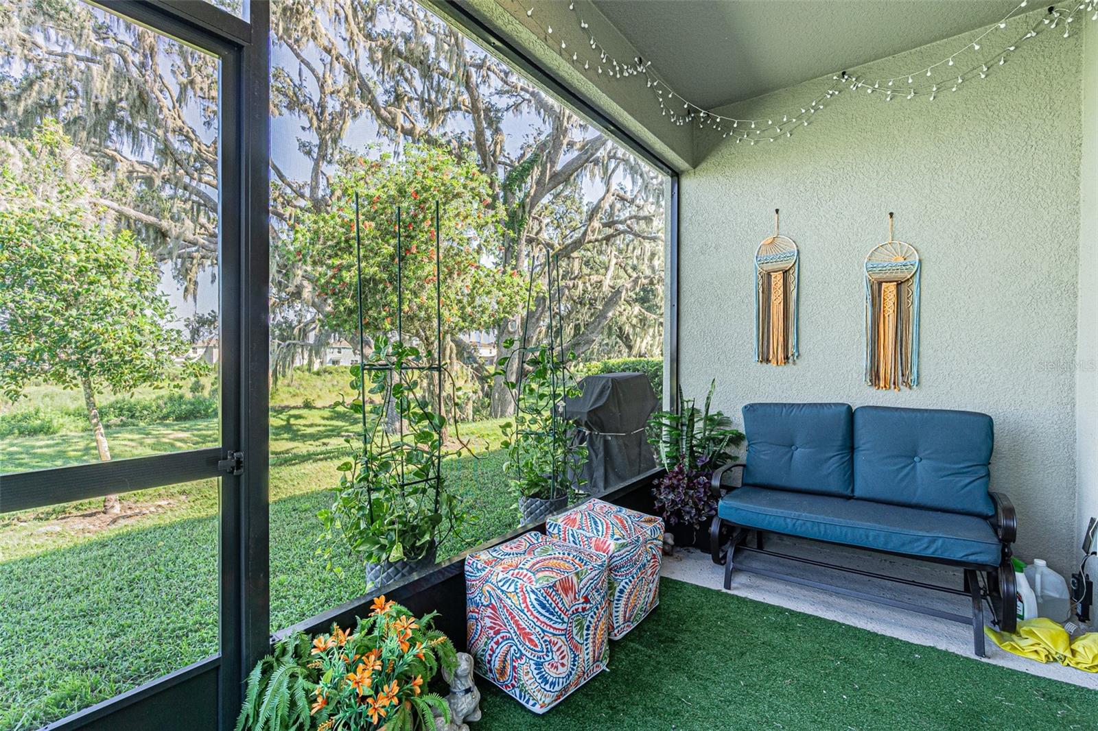 Sit and relax on your screened covered back porch