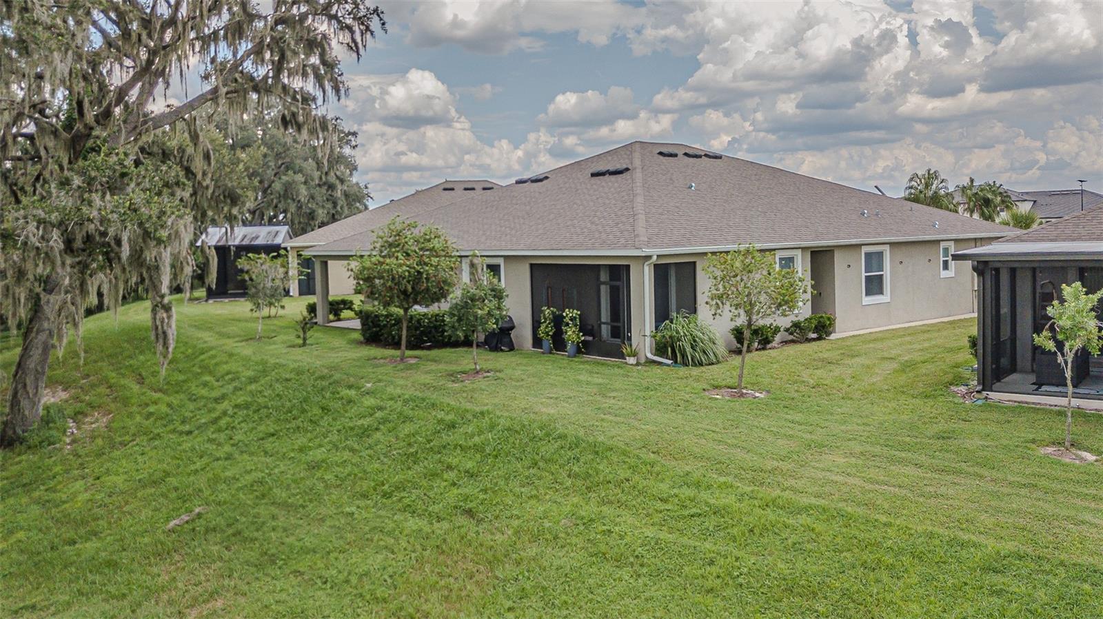 Lots of lawn behind home
