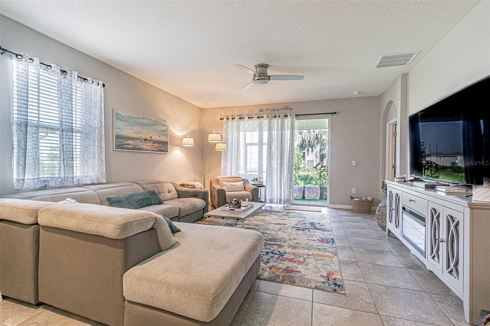 Great room with sliding doors to screened porch