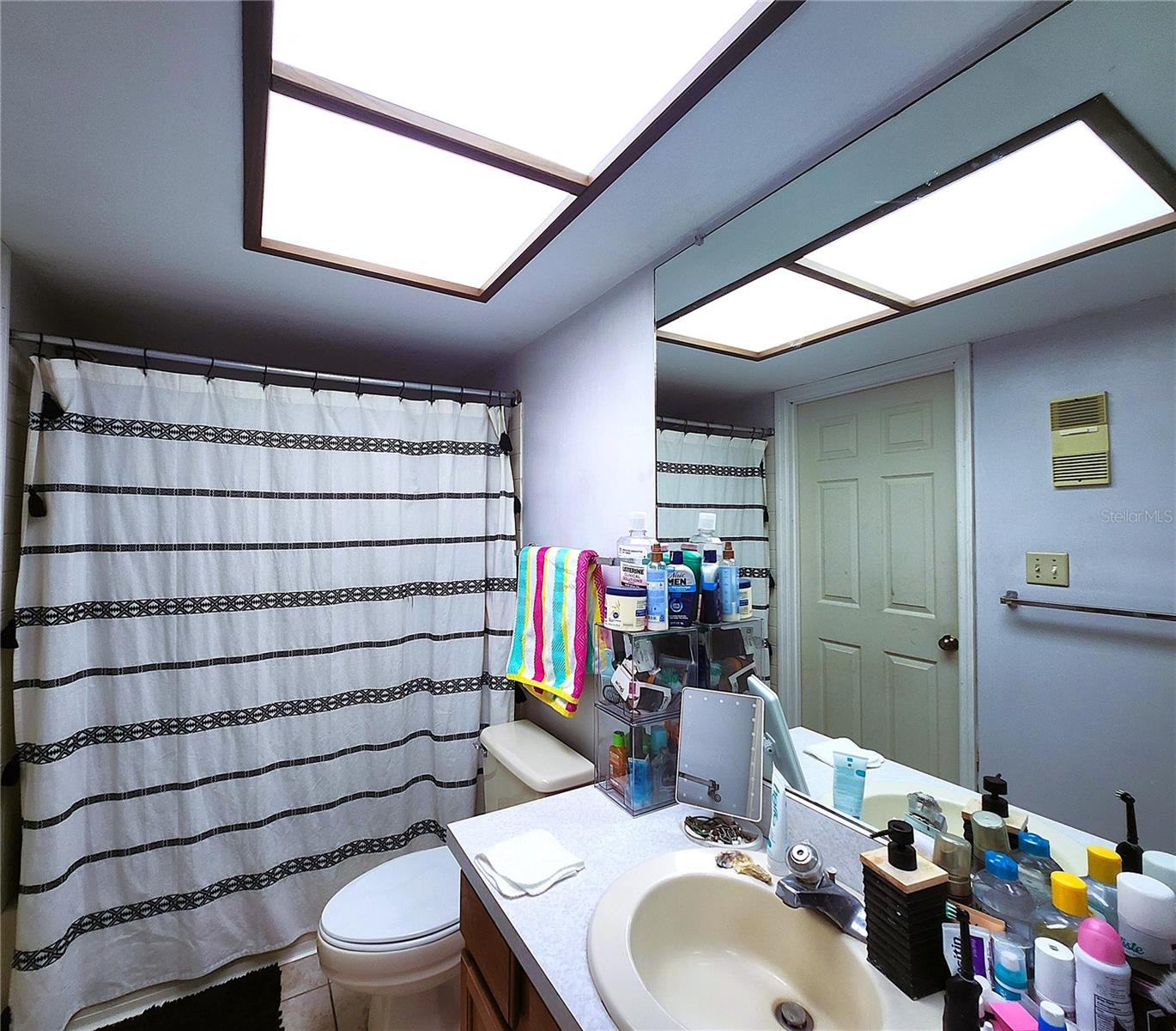 Bathtub, Shower, lLnen Closet, Medicine Cabinet. Bathroom has two access doors