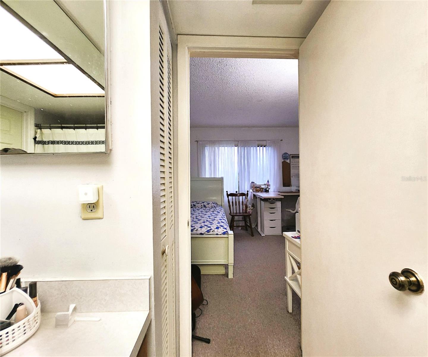 Bathroom includes Linen Closet and dual entry