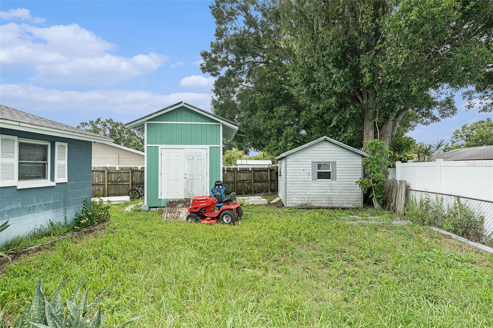 Two spacious sheds for extra tools and storage