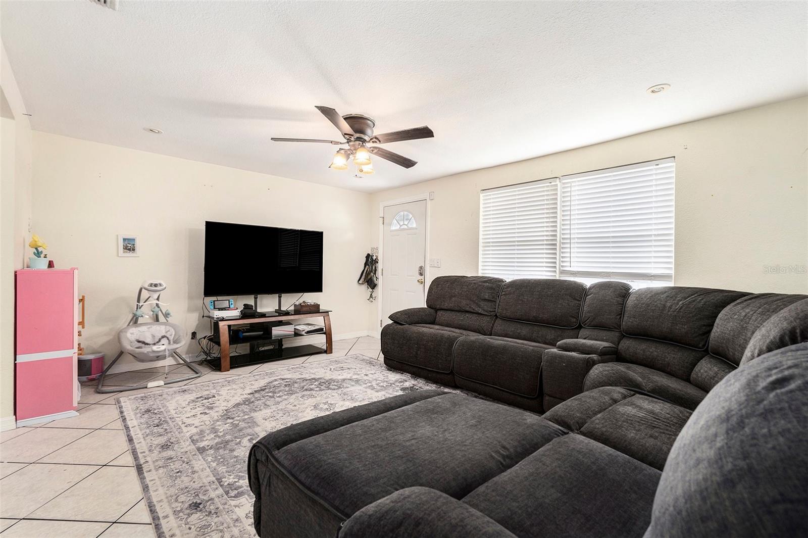This airy living room is waiting for your huge dream couch