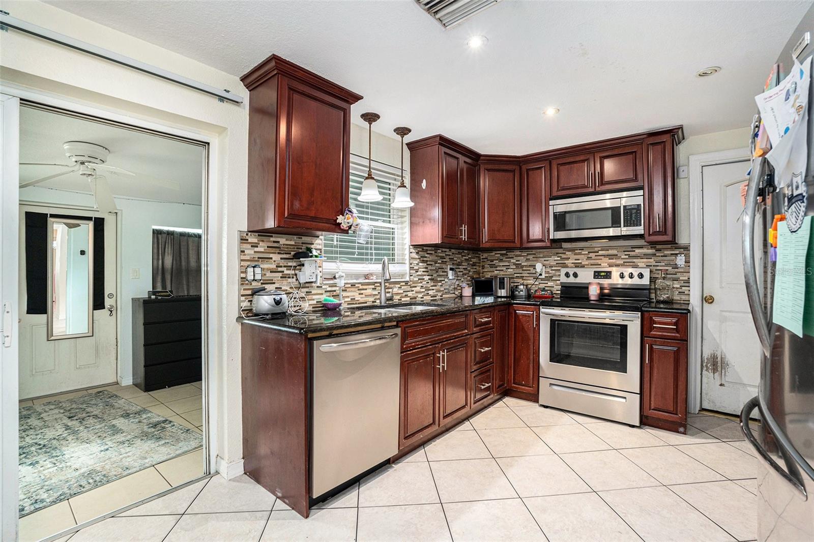 Gorgeous cabinetry, and the versatile den right off of the kitchen