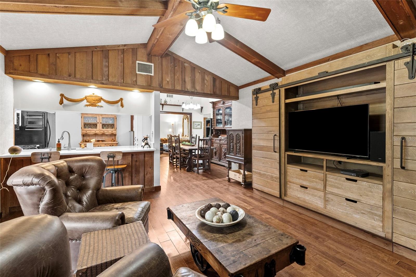 Family room looking toward dining room and kitchen